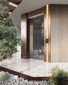 Elegant Dubai living space featuring a built-in home elevator with wood paneling, marble flooring, indoor plants, and ambient lighting—designed by House of Kalaa.