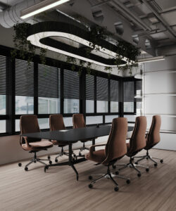Modern office meeting room in Dubai featuring a sleek black table, six brown swivel chairs, large windows, and light fixtures with greenery—designed by House of Kalaa.