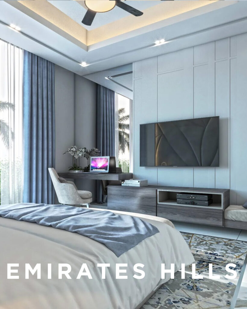 Stylish Emirates Hills bedroom featuring a cozy bed with blue accents, work desk with computer, mounted TV, patterned rug, and elegant drapery—designed by House of Kalaa.